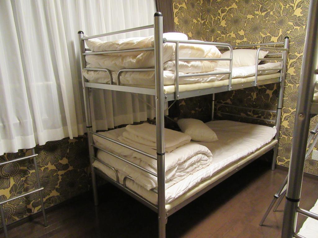 Guesthouse Tiga Kumamoto Quarto foto